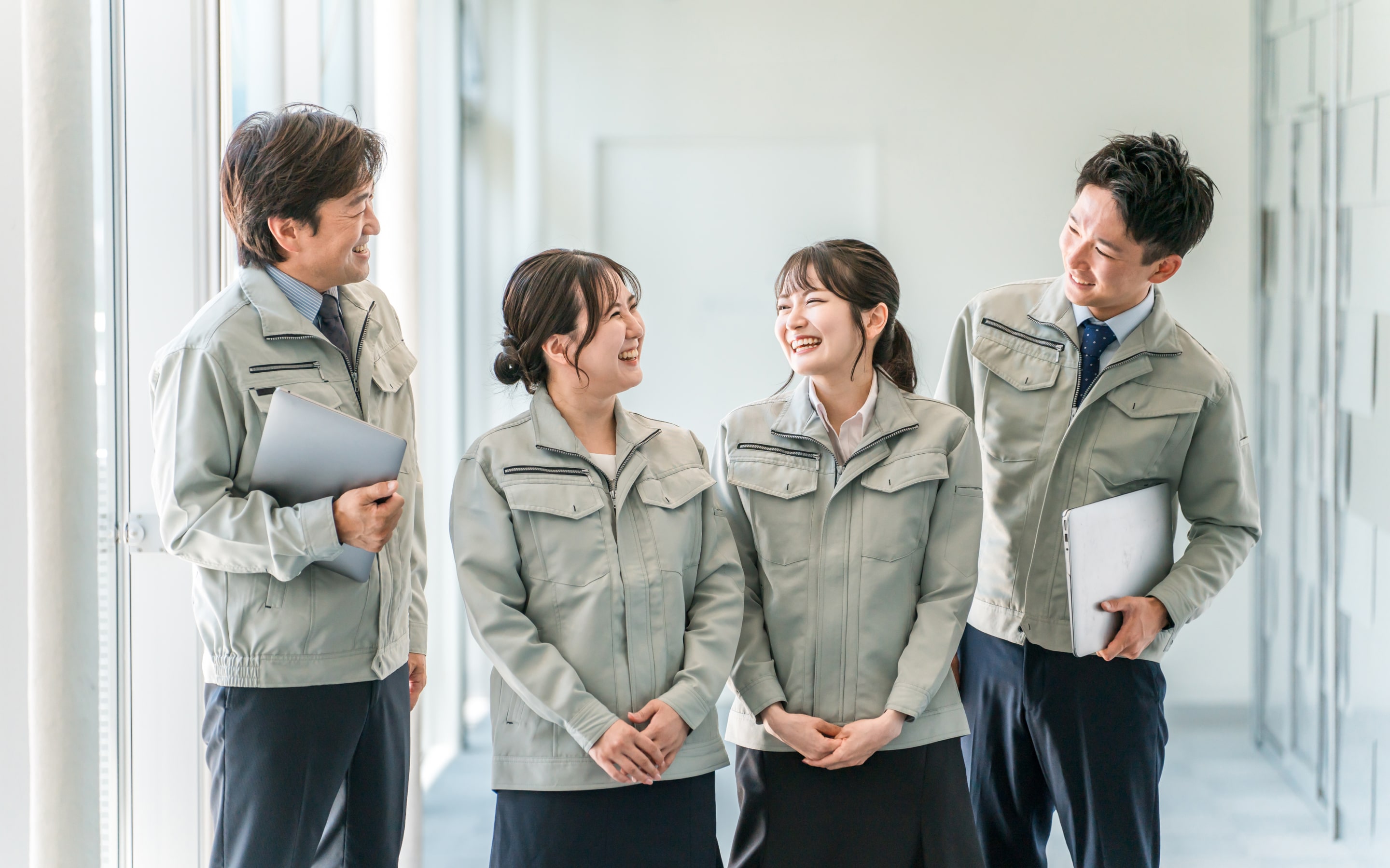 image of men and women talking at their working place for PC