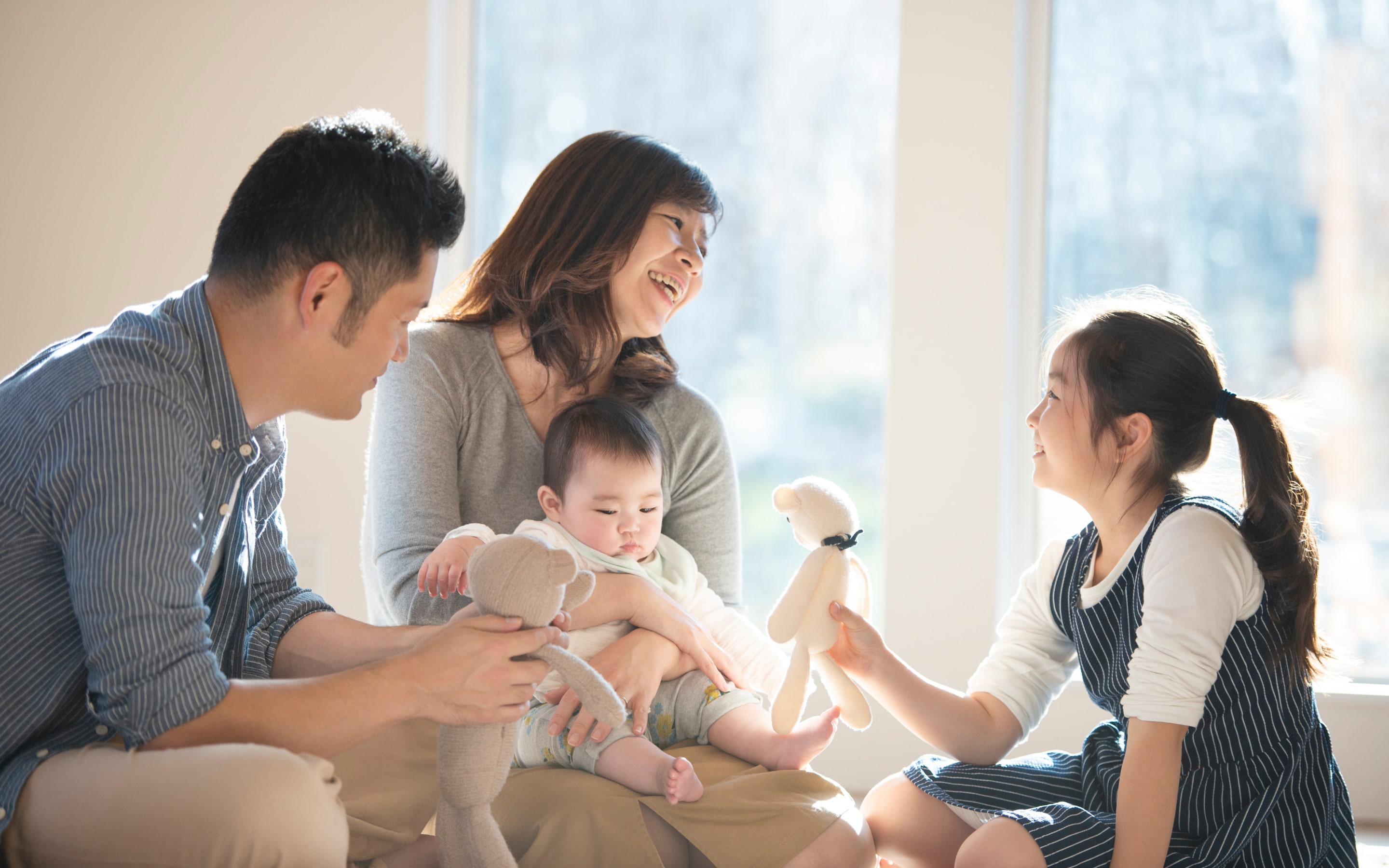 image of smailing faces in a family